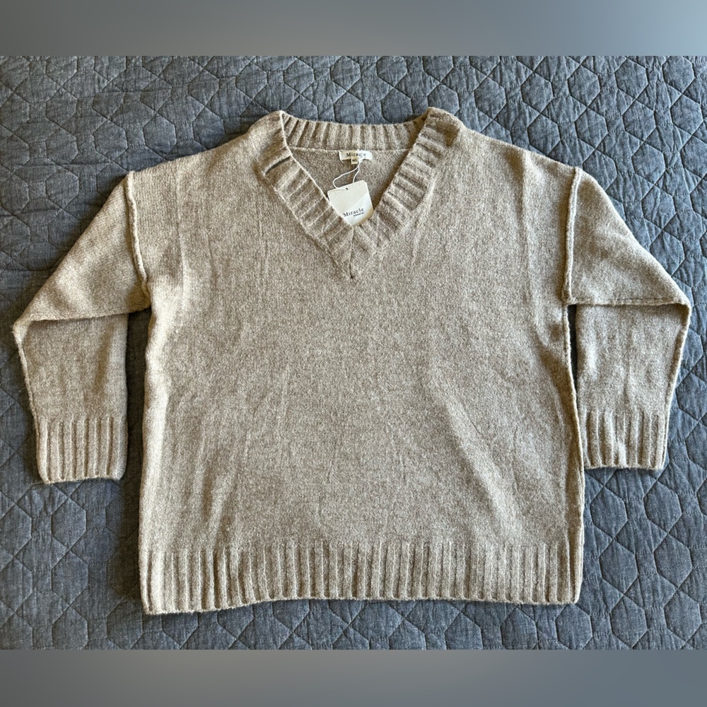 NWT Miracle oatmeal colored v-neck sweater with raw seams - size M/L